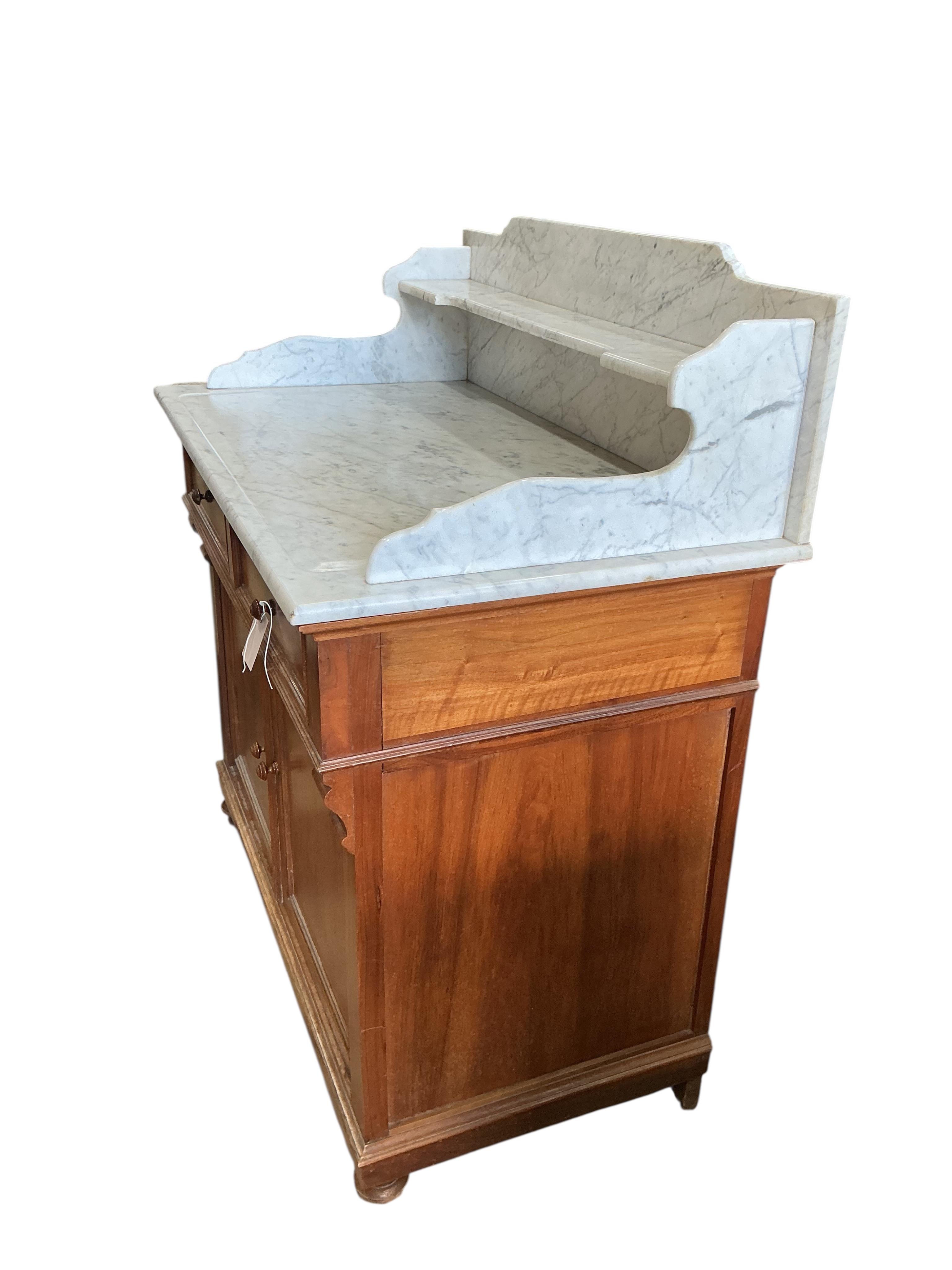 An early 20th century French marble top mahogany washstand, width 100cm, depth 56cm, height 110cm